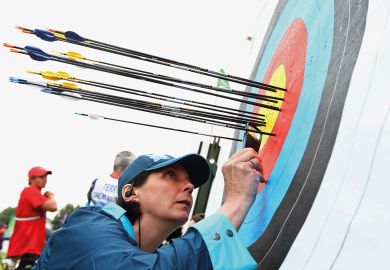An official inspects the target during the Archery Ranking Round  in London, England to illustrate UK R&D spend ‘should match countries that invest the most’