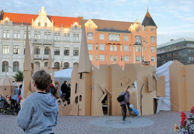 People have built a Cardboardistan, a cardboard city, in the Kasarmitori square at the Night of the Arts, Taiteiden Yo, Helsinki, Finland to illustrate Relaxed thesis requirements ‘devalue’ PhD, candidates fear