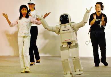 "Asimo", the world's first robot that walks like a human demanding applause from the crowd in Malaysia, Kuala Lumpur
