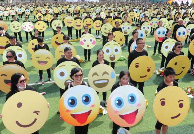 People holding emoji faces to illustrate boycott-busting Queen Mary markers blasted for ‘basic’ feedback