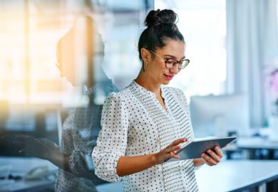 Woman holding iPad