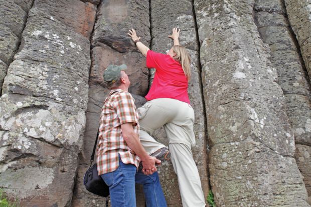 german-r-uberleiter-helping-another-person-climb-to-an-elevated