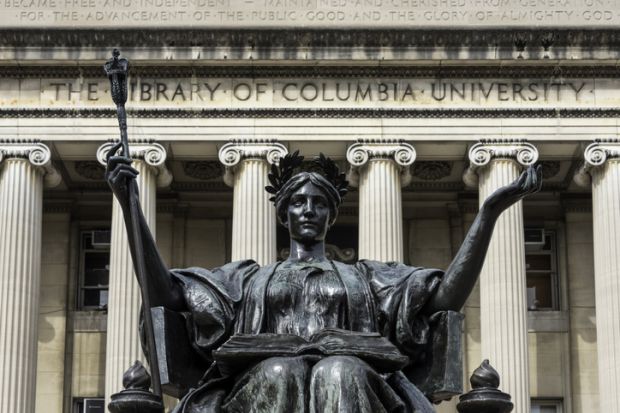 “Alma Mater,” a bronze statue by Daniel Chester French (1852-1931) welcomes students and visitors from the monumental staircase of Low Library at Columbia University.