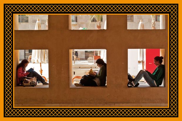 Students sitting on wall, American University in Cairo, Egypt