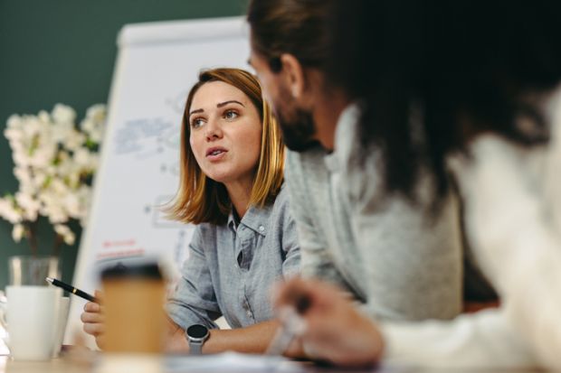 A woman at a business meeting, symbolising entrepreneurship