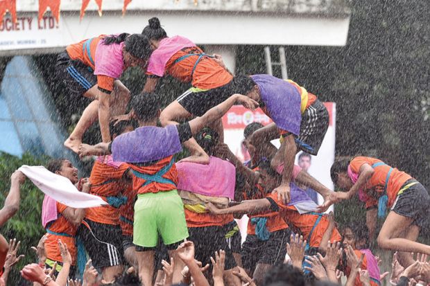 crowd of people climbing