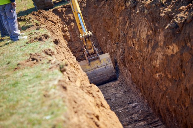 Digging foundations, symbolising foundaiton years