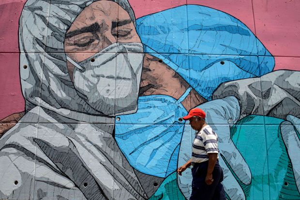 Mural of medics embracing