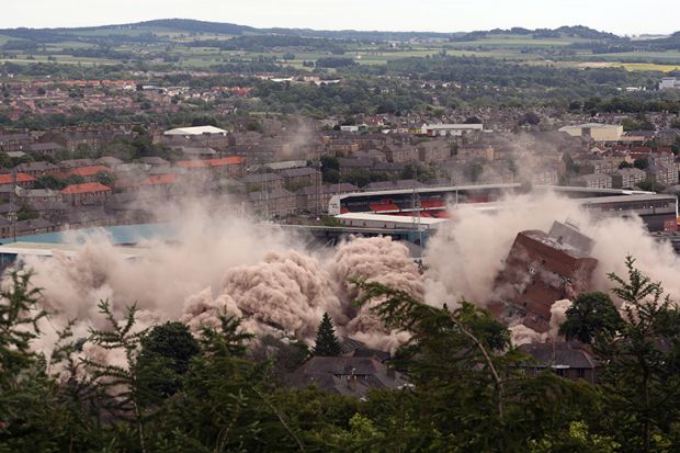 A general view of the Butterburn and Bucklemaker multi storey flats in the Hilltown area of Dundee, being razed to the ground during demolition. Illustrating that cuts at the University of Dundee will take a ‘wrecking ball’ to research and local economy