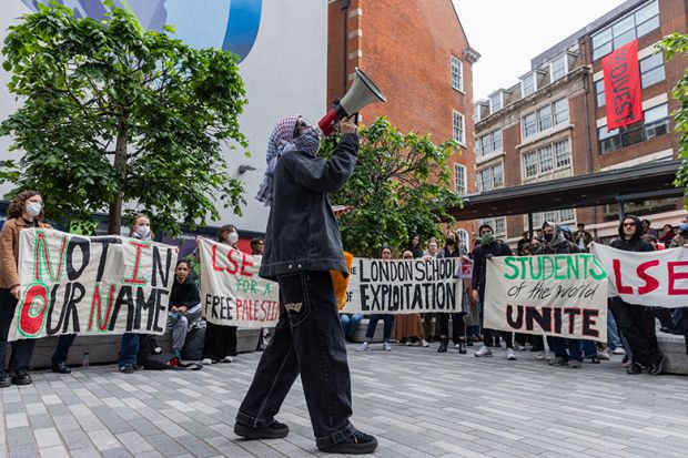 Students from the London School of Economics (LSE) Student Union Palestine Society hold a rally to launch a divestment report on 14th May 2024 in London, UK. The students later occupied the ground floor of the Marshall Building of the LSE.