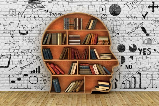 Human head-shaped bookshelf stacked with books