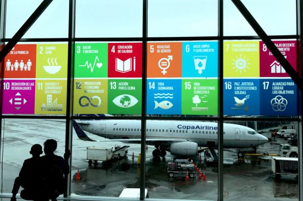 Global goals displayed in Spanish at the airport