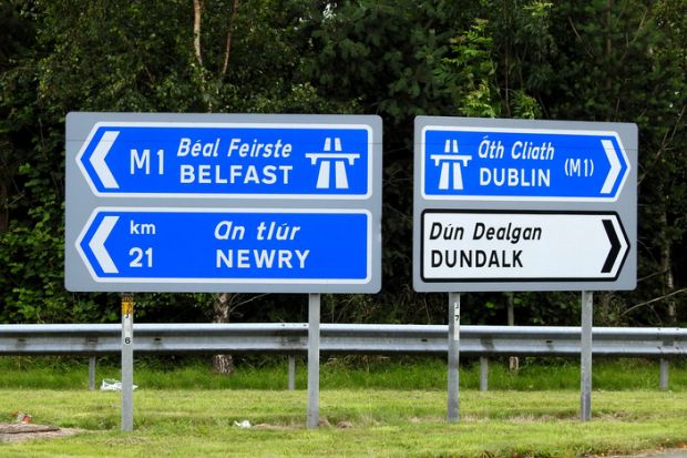 Road signs point to places in Northern Ireland one way and the Republic the other