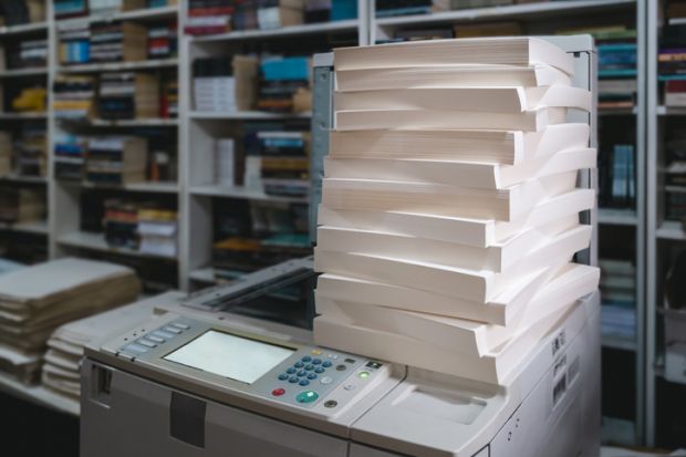 Stacks of paper on photocopier