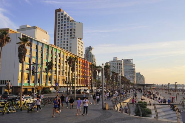 Dan Tel Aviv hotel and Tel Aviv promenade in the evening