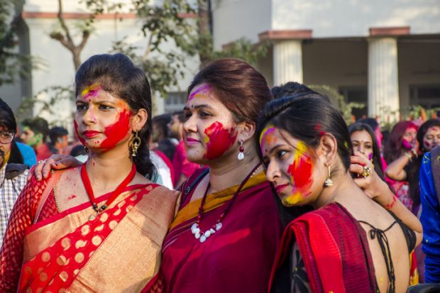 Students at the Rabindra bharati University Complex in Kolkata are all celebrating the Holi Festival.