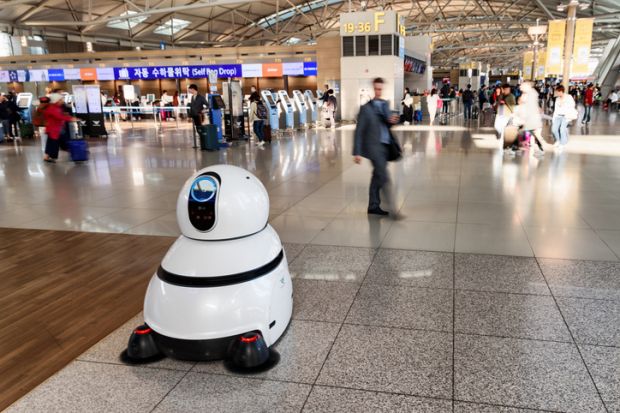 The airport cleaning robot in main hall of Incheon airport