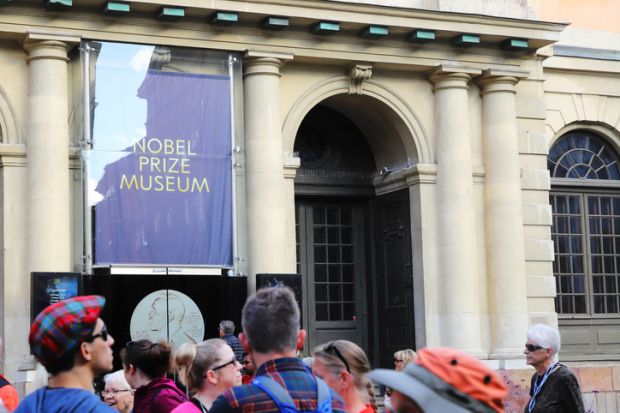 People outside the Nobel prize museum located in Stockholm