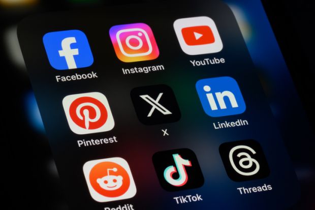 Popular social media apps on an Apple iPhone: Facebook, Instagram, YouTube, Pinterest, X (formerly Twitter), LinkedIn, Reddit, TikTok, and Threads