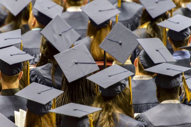 Graduating students wearing mortarboards