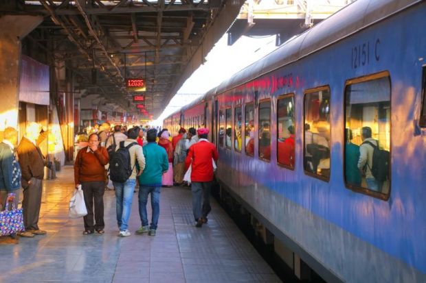 People walking at Jaipur Junction railway station in Rajasthan.