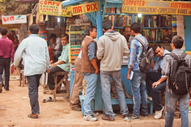 Students looking for the different books at outdoor book market on January 15, 2013.