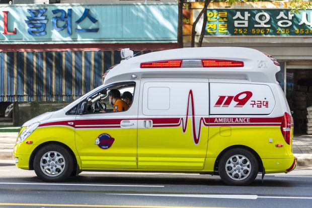 Ambulance goes on the city in Seoul - South Korea.