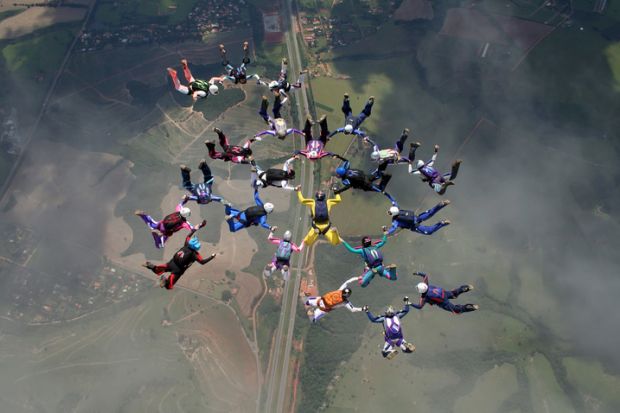 A group of parachutists jumping from an airplane on July 25, 2017 in São Paulo