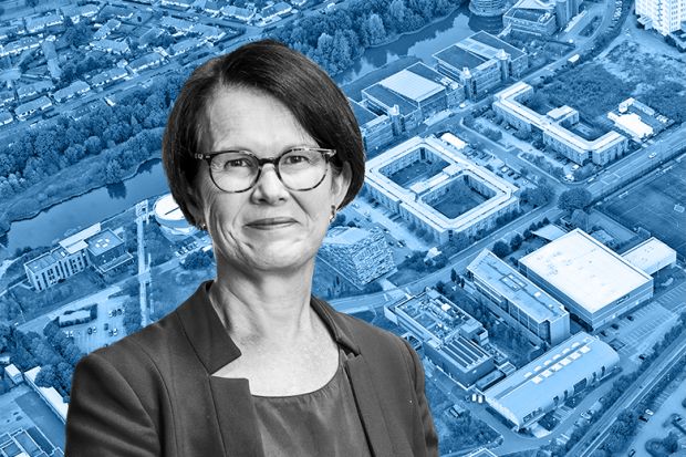 Jane Norman, University of Nottingham vice-chancellor, with an aerial shot of the Jubilee campus in the background.