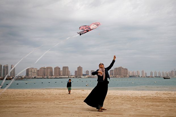 Flying kite on beach