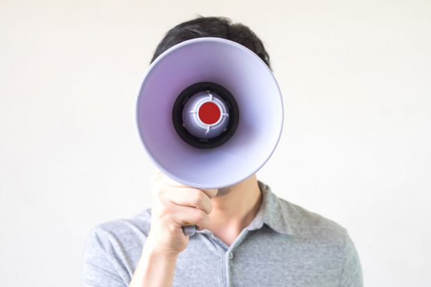 Man with megaphone for a face