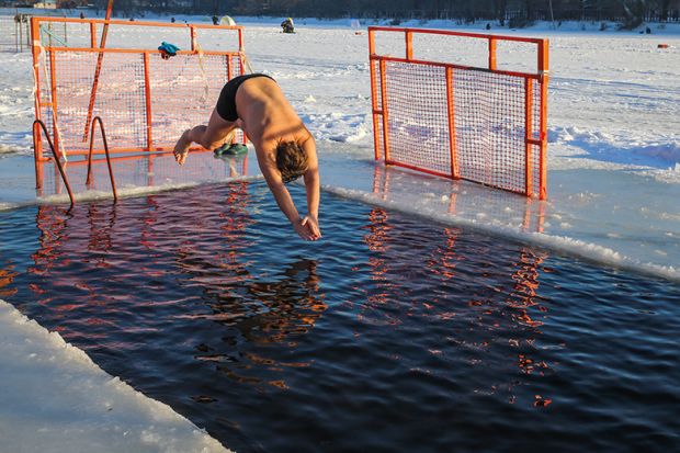 diving into cold lake