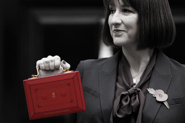 Rachel Reeves holding miniature budget case, to illustrate that universities should be looking for small wins with regards to government funding.