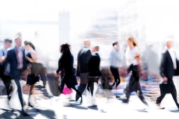 Business people walking at rush hour