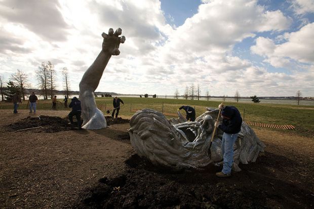 Head and arm sculpture