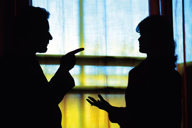 Silhouettes of man and woman