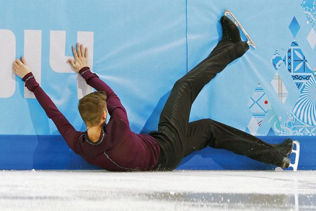 Skater falls on the ice