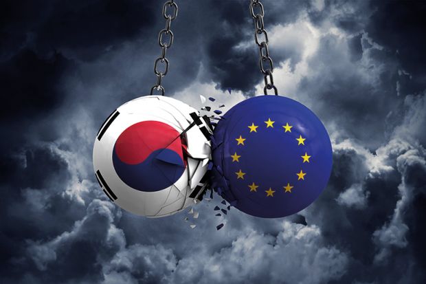Image of two wrecking balls colliding: one painted with South Korea flag, one painted with the European Union flag