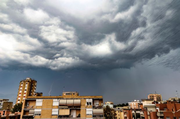 Thunderstorm gathering over city