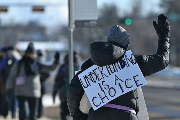 Members of the Canadian Union of Public Employees (CUPE) hold a picket demanding better education funding, braving the freezing temperatures of -24°C (-35°C with wind chill), in Edmonton, Alberta, Canada, on 19 February 2025.