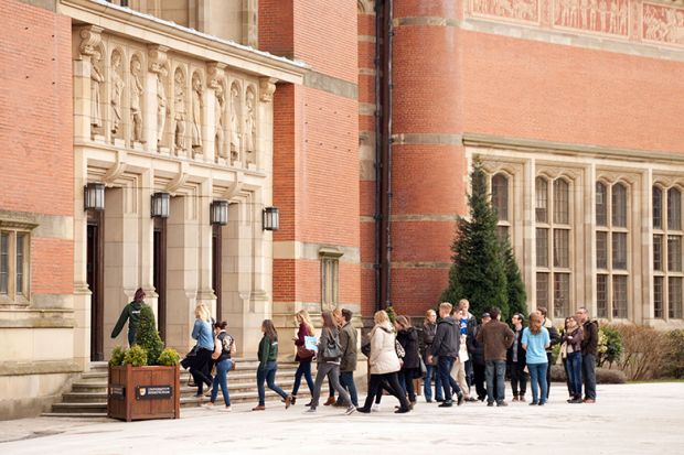 People in Chancellors Court, University of Birmingham, a red brick university, Edgbaston campus, UK