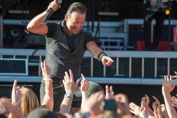 Bruce Springsteen performs with the E Street Band at Hampden Park choosing fans with their hands in the air to illustrate ‘Case can be made’ for differential fees, poll indicates