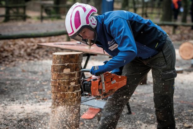Participant in the Logging Dutch Championships to illustrate Dutch research funding cuts will ‘reverse years of progress’