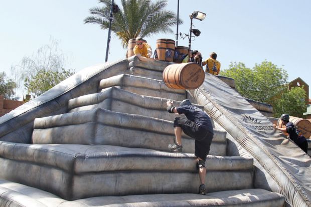 Contestants compete on the Barrel Roll at the Cuervo games in Tempe, Arizona to illustrate ‘Bumpy road’ ahead for US universities recruiting overseas