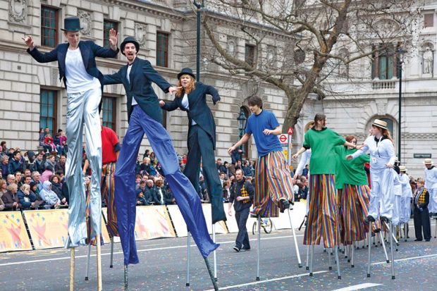 Circus taking part in London's  New Year's Day Parade, Whitehall, London England, to illustrate Who should pay to fill  fee deficit, students or the public?