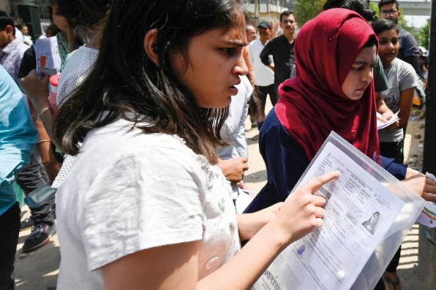 Students arrive to appear for the Common University Entrance Test to illustrate India urged to develop ‘world class’ English test as demand rises