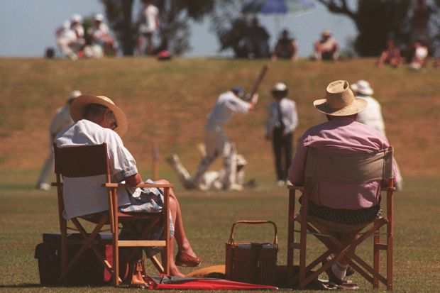 A fan is asleep during a cricket match to illustrate Great holidays can fuel  our intellectual passions