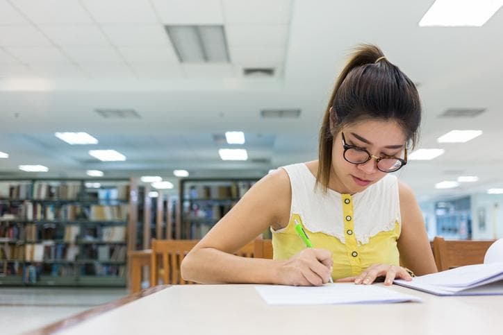 Student studying in library