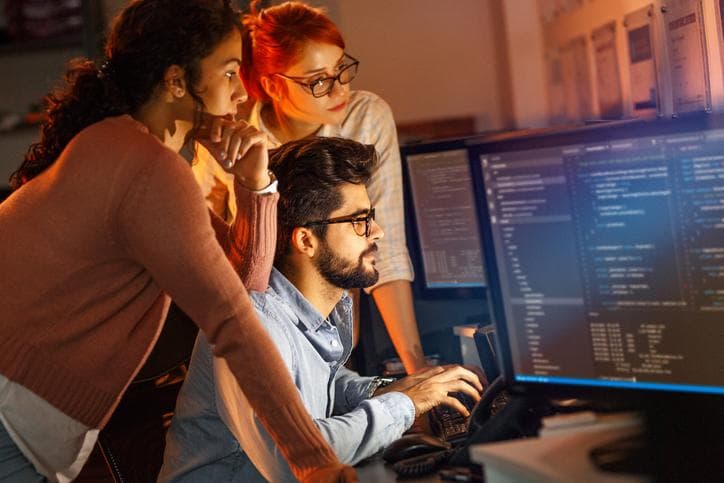 Students working around a computer